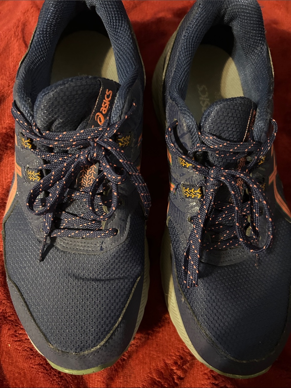 Asics woman’s Navy Running Shoes with Orange Accents size 8